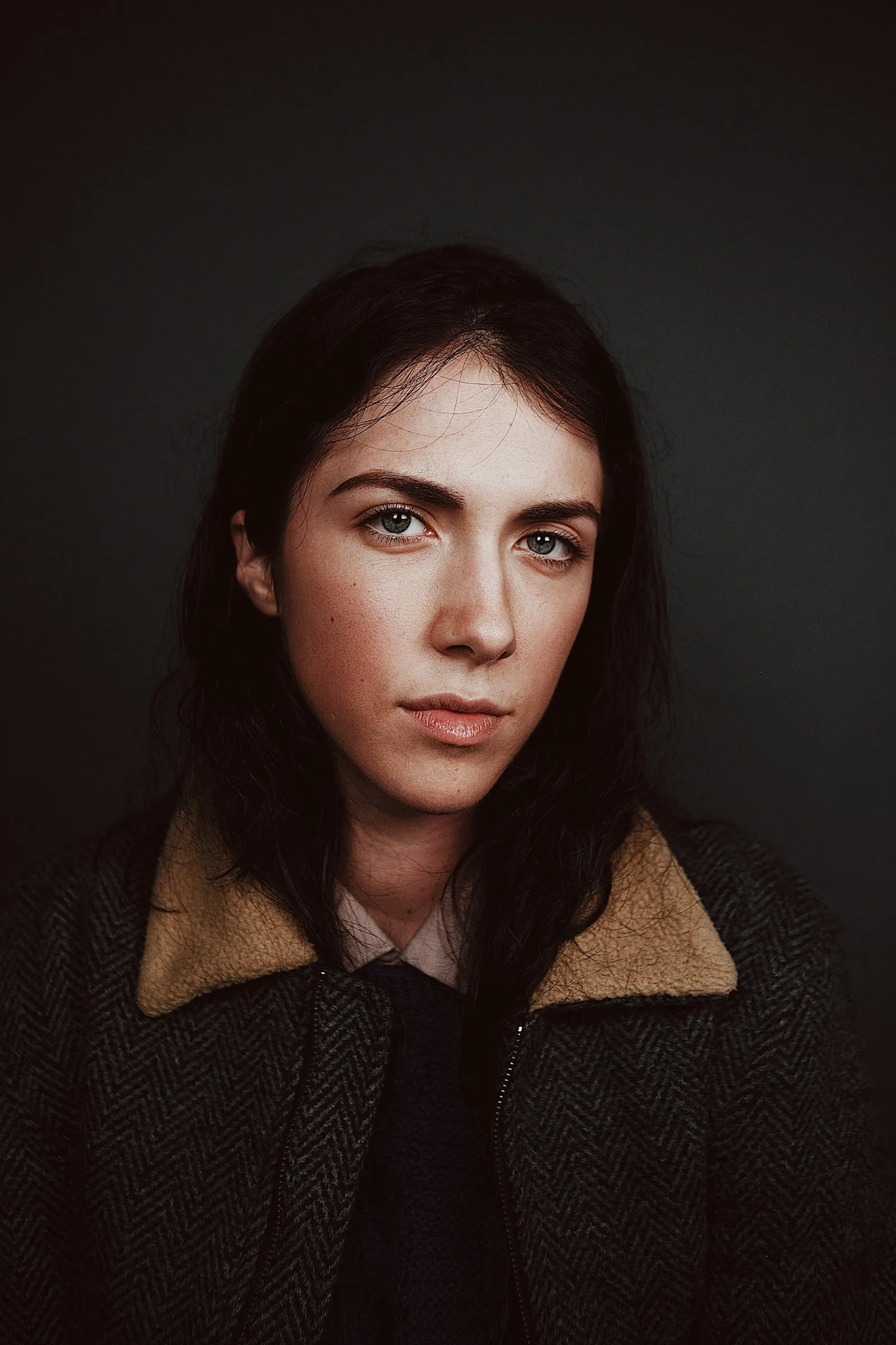Portrait of a woman in a coat